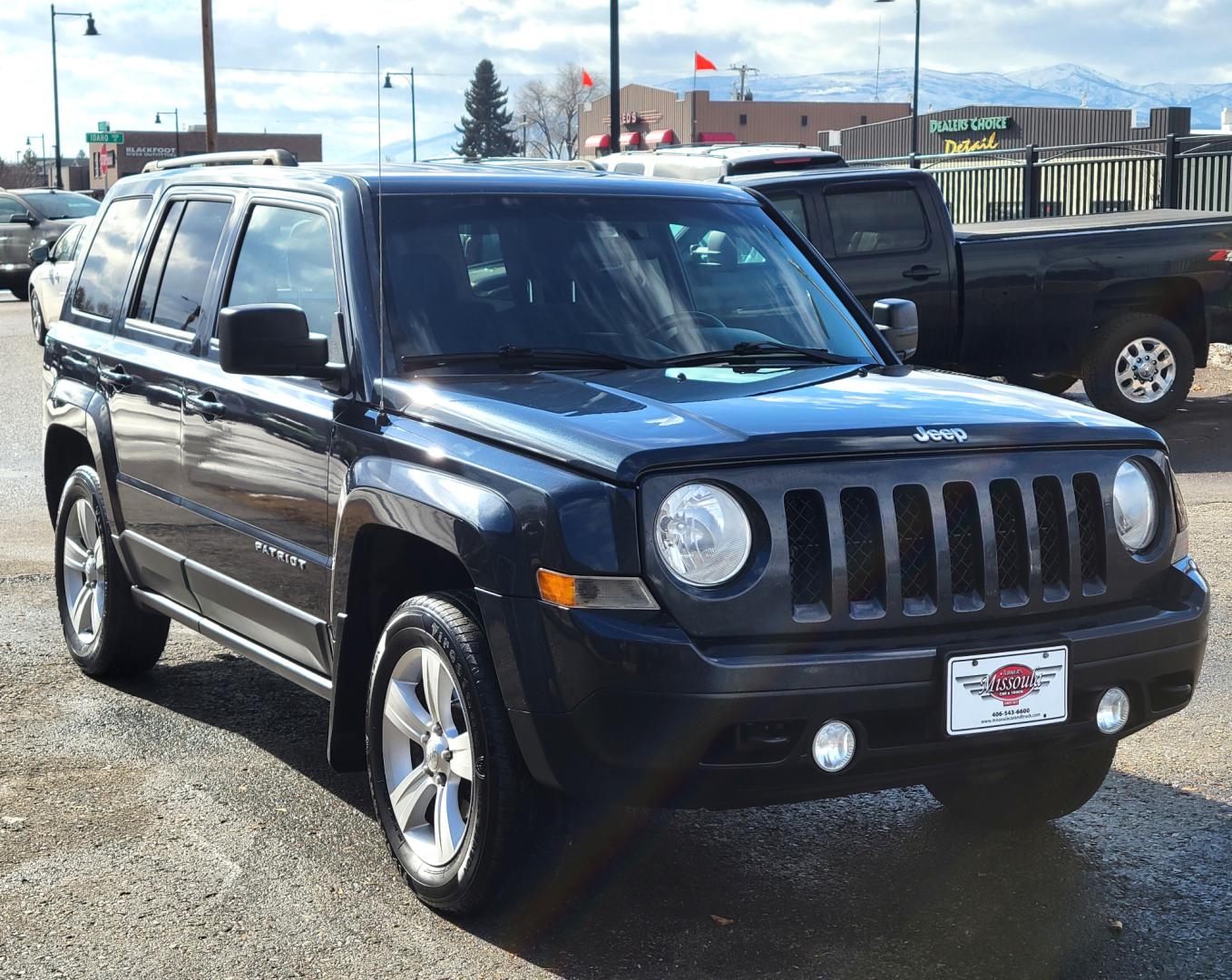 2014 Blue /Black Jeep Patriot Latittude (1C4NJRFB7ED) with an 2.4L I4 engine, 6 Speed Automatic transmission, located at 450 N Russell, Missoula, MT, 59801, (406) 543-6600, 46.874496, -114.017433 - Photo#2